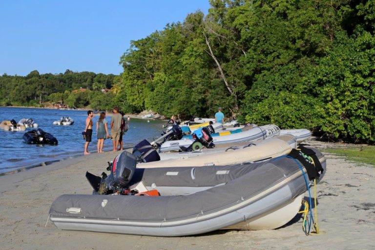 Beach packed with dinghies for holiday potluck