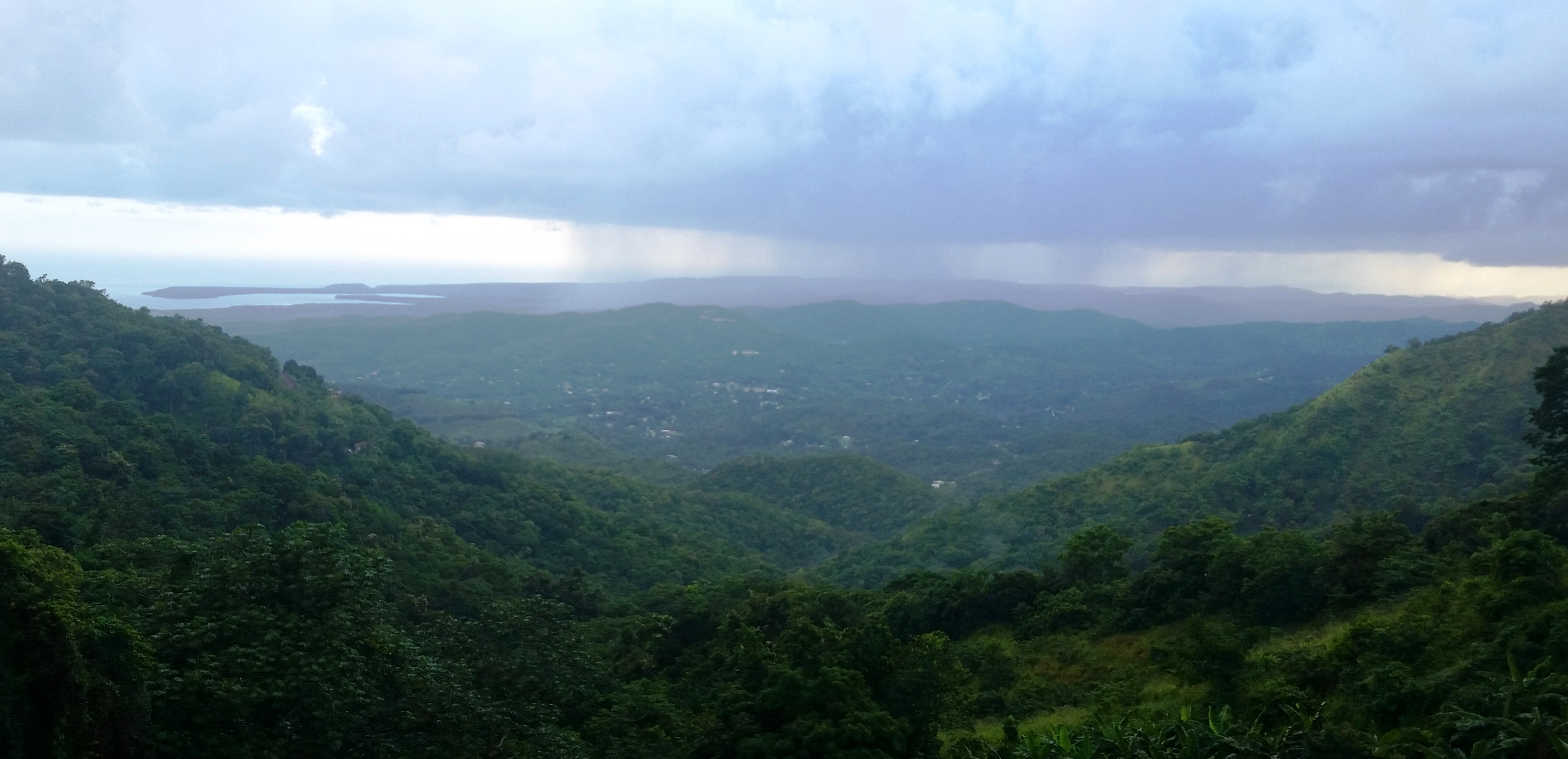 View from the mountaintop pizzeria of the regular, afternoon storm rolling in. 